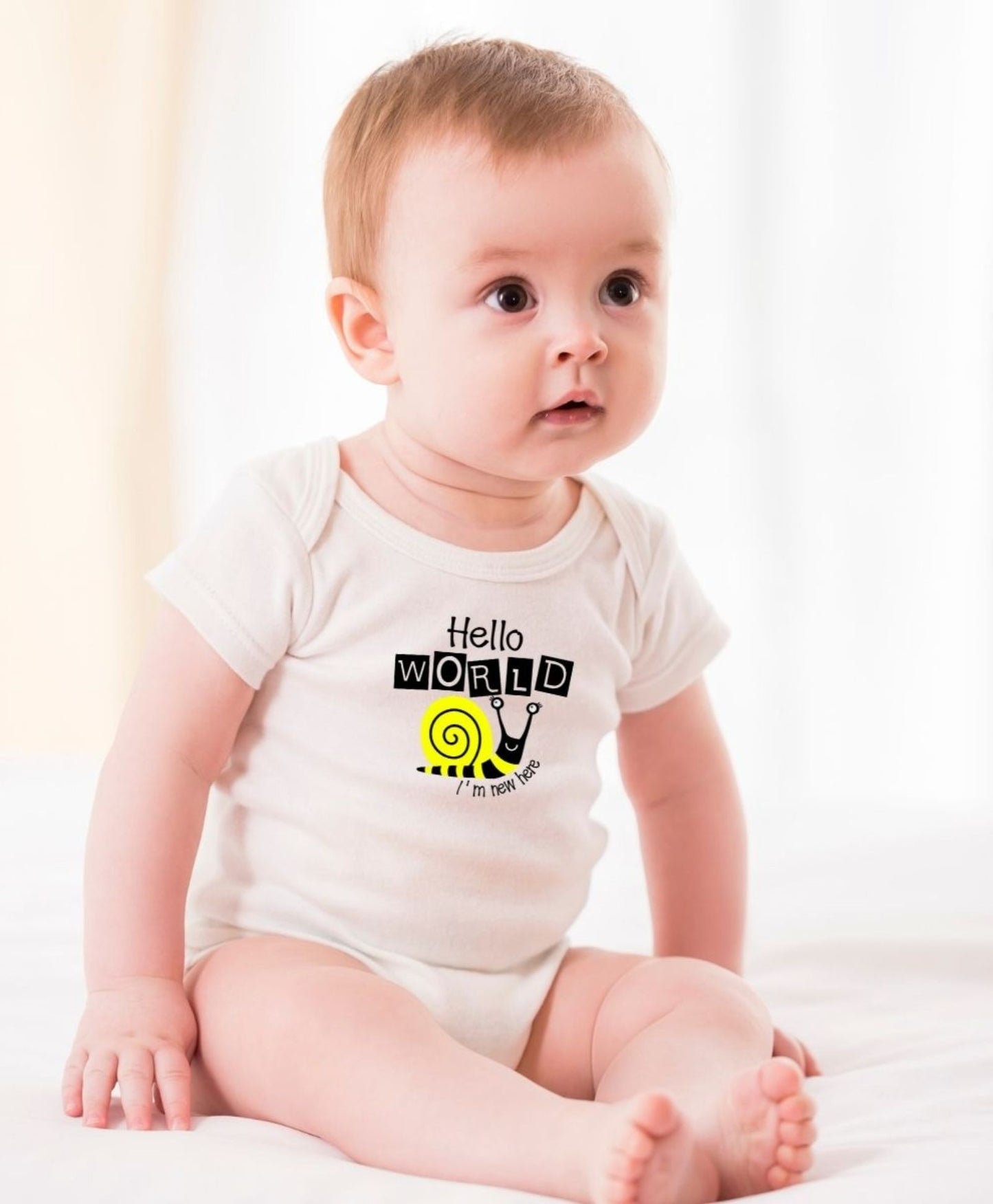 "Hello World, I'm New Here" Organic Cotton Baby Onesie